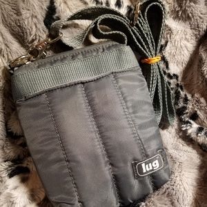 Lug crossbody shoulder pouch pre owned.